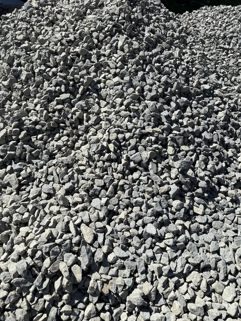 Dump truck material delivery
